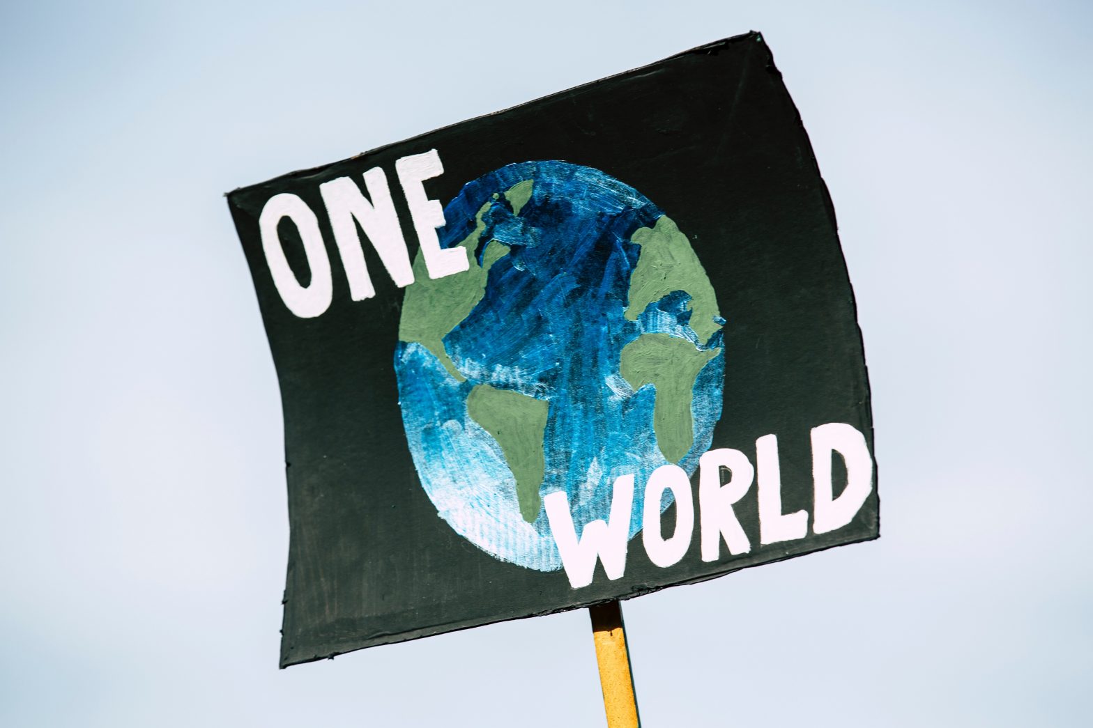 Sign that reads "One World"